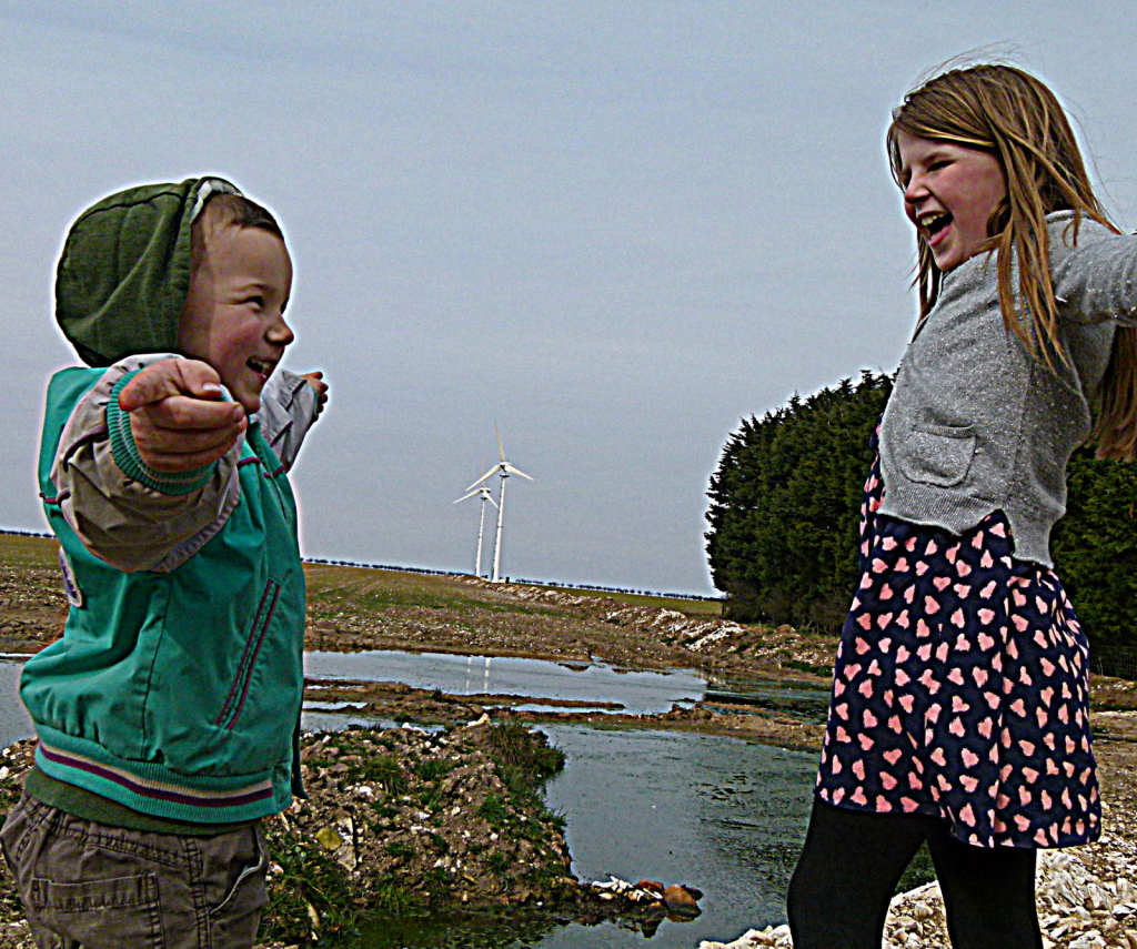 The Savile Children of Raven Hill Farm infront of their two Endurance E-3120 wind turbines